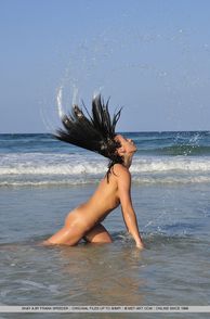Hot Wet Nudist Whipping Her Hair Back